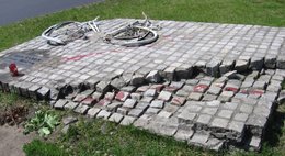 Destroyed bicycle and tank-track - symbol of Chinese protest in Polish city, Wroclaw